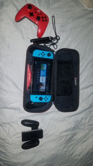 Nintendo Switch With Included Accessories