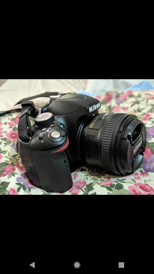 Nikon D3200 With A Kit Lens And A 70-300 Lens