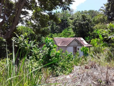 1/2 Acre Of Land With Older Type House 