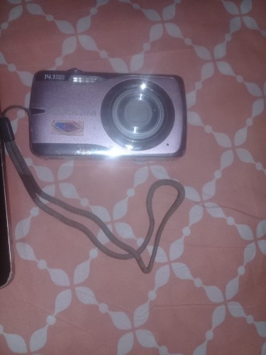 Casio Exilim.(charger Not Included)
