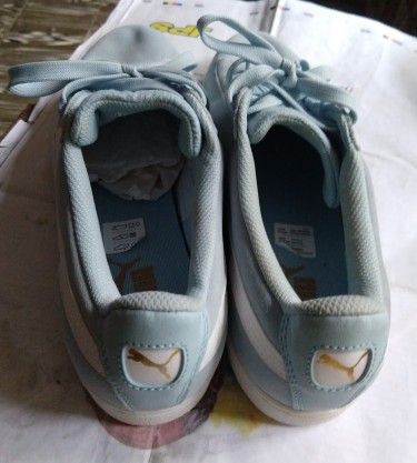 Blue And White Size 10 Puma Sneaker.
