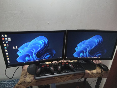 Lenovo Desktop PC With Monitors And Gamepads