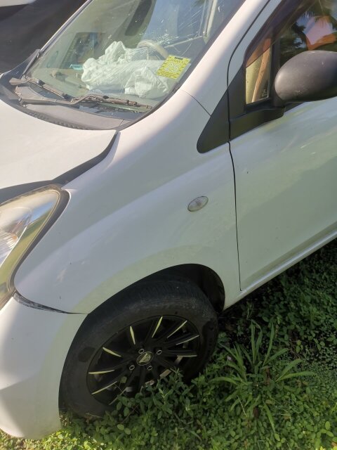 Damaged 2014 Suzuki Alto