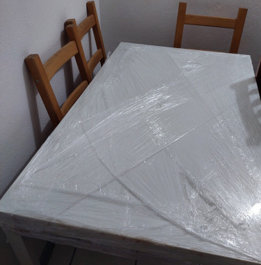 White Rectangular Table With Pine Coloured Chairs 