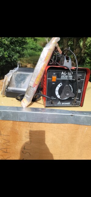 Arc Welding With Helmet And Rod For Sale