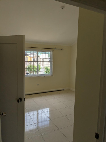 2 Bedroom Townhouse In SE 1st ST East Queens Park 