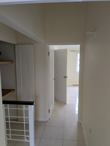 2 Bedroom Townhouse In SE 1st ST East Queens Park 