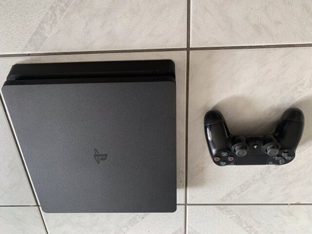 PS4 Slim 1TB Console + 2 Free Games