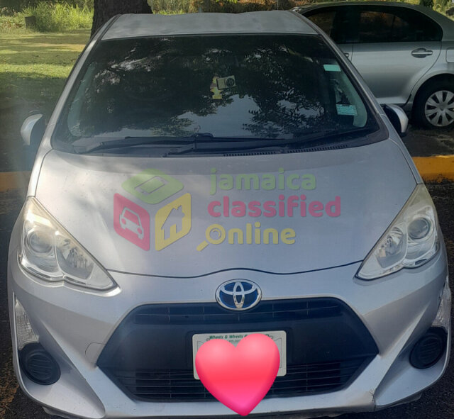 Toyota, Aqua 2017 (Hybrid) -Grey Cars Portmore